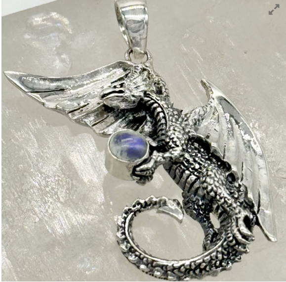 Dragon Holding Stone Pendant