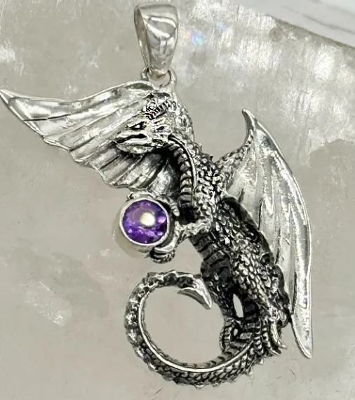 Dragon Holding Stone Pendant